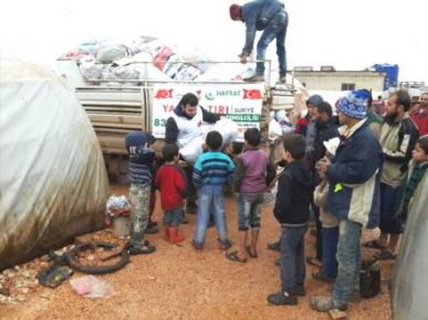 SURİYELİ ÇOCUKLAR, TÜRKİYE'NİN YARDIMLARIYLA HAYATA TUTUNUYOR